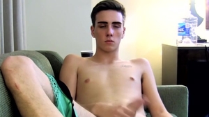 BoyFeast.com: Trey jerking big cock on sofa